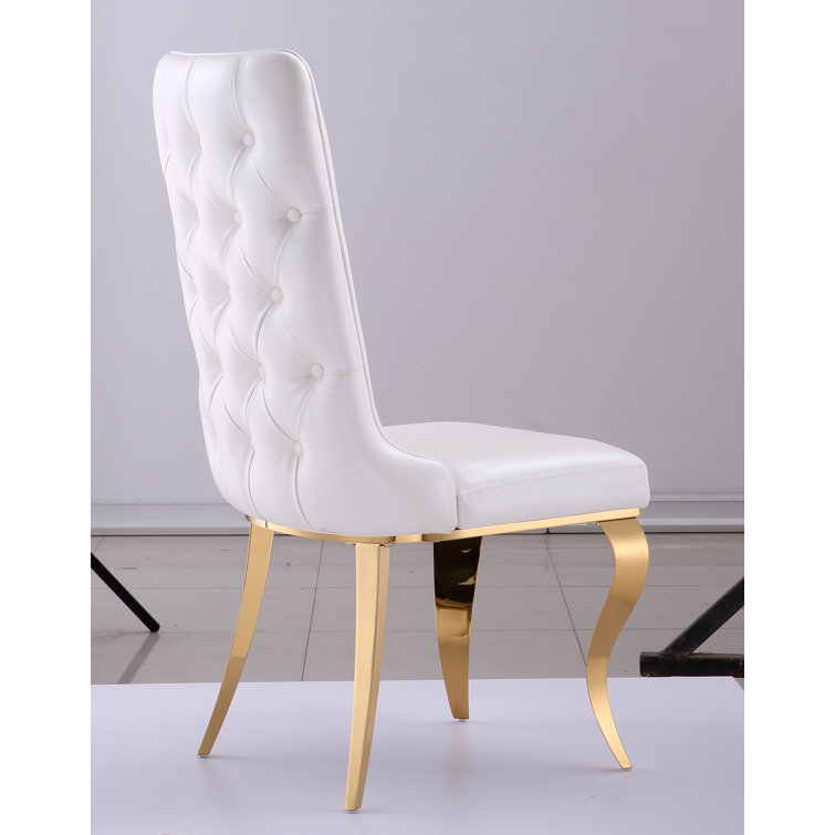 White leather chairs discount with gold legs